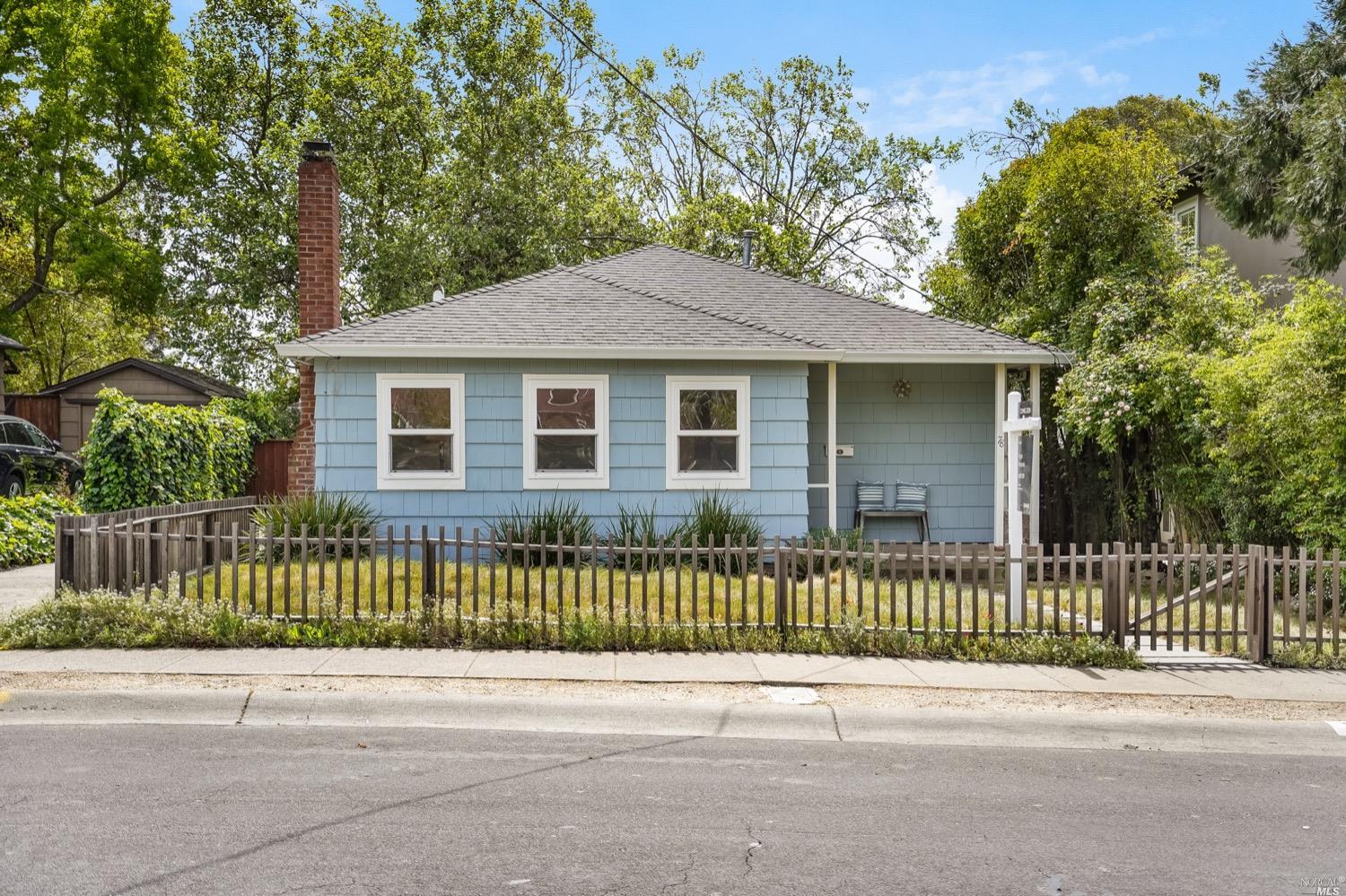 78 Nelson Avenue Mill Valley, CA 94941 - Photo 1 of 21 a front view of a house with a garden and plants