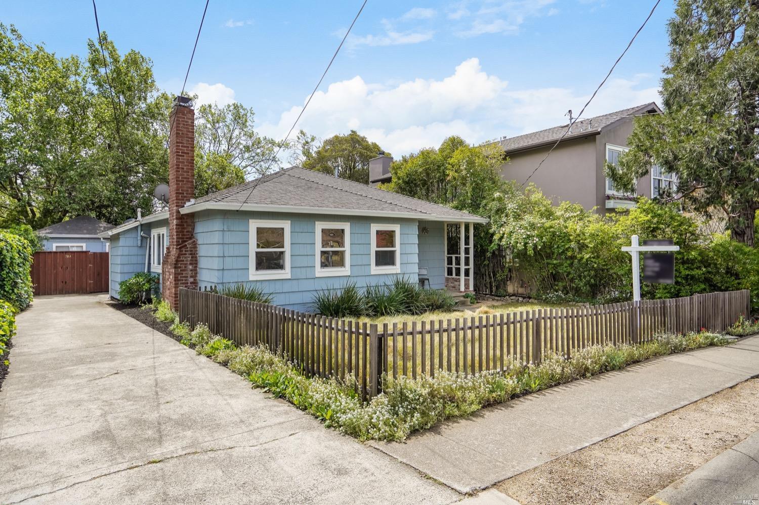 78 Nelson Avenue Mill Valley, CA 94941 - Photo 2 of 21 a front view of a house having iron fence