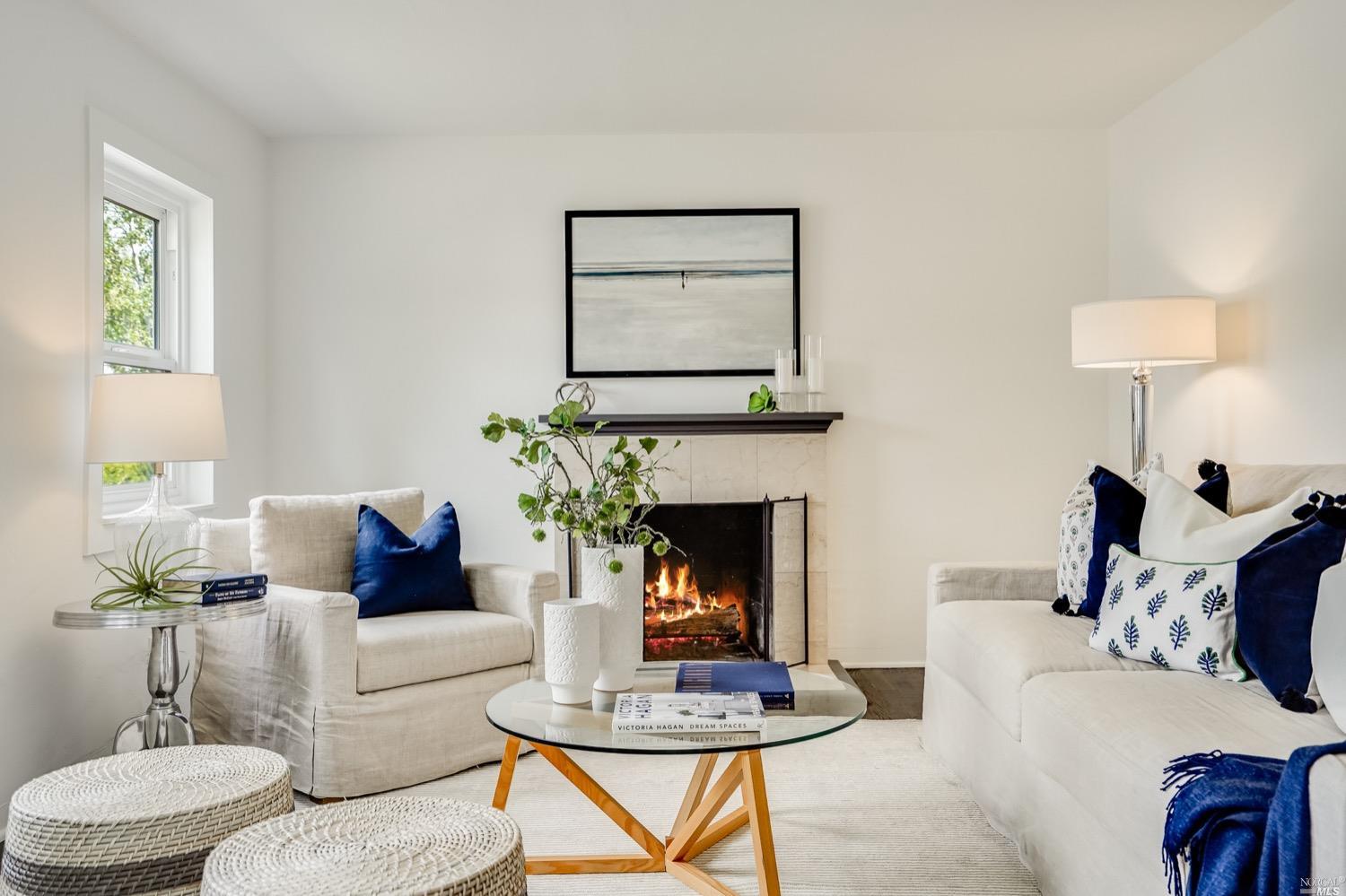 78 Nelson Avenue Mill Valley, CA 94941 - Photo 4 of 21 a living room with furniture a table and a fireplace