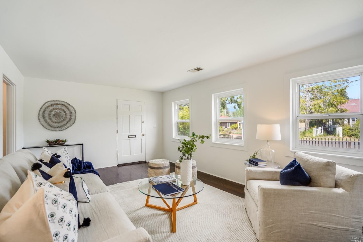 78 Nelson Avenue Mill Valley, CA 94941 - Photo 6 of 21 a living room with furniture and a large window