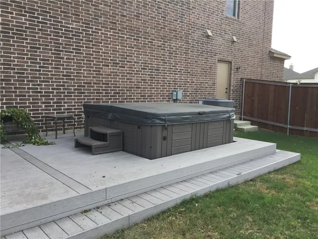 a view of backyard with a chair