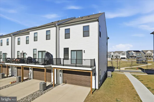 a front view of a house with outdoor area