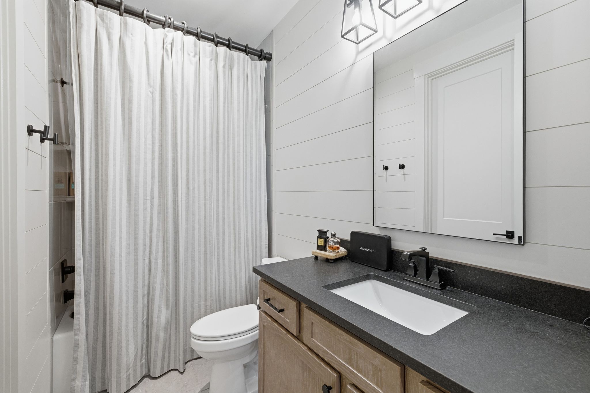 1733 Rigsby Avenue Murfreesboro, TN 37129 - Photo 37 of 57 a bathroom with a granite countertop sink and a toilet