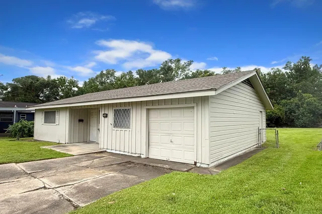 a view of a backyard with a garden