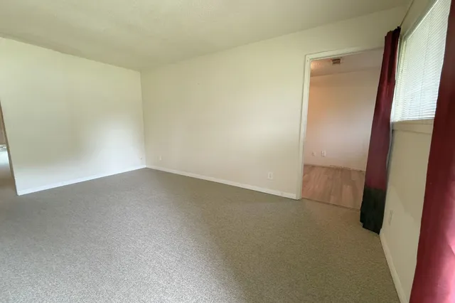 an empty room with a door