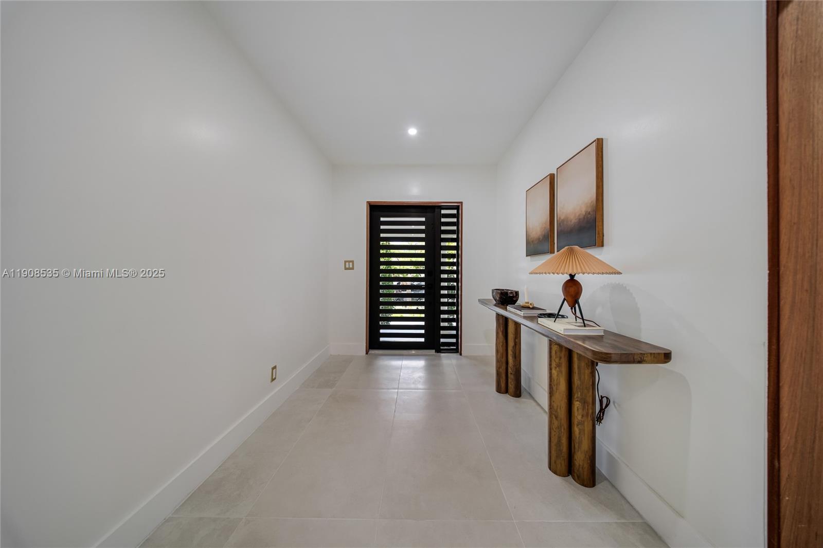 1244 Southwest 14th Street Miami, FL 33145 - Photo 24 of 63 a view of a livingroom with entryway and furniture