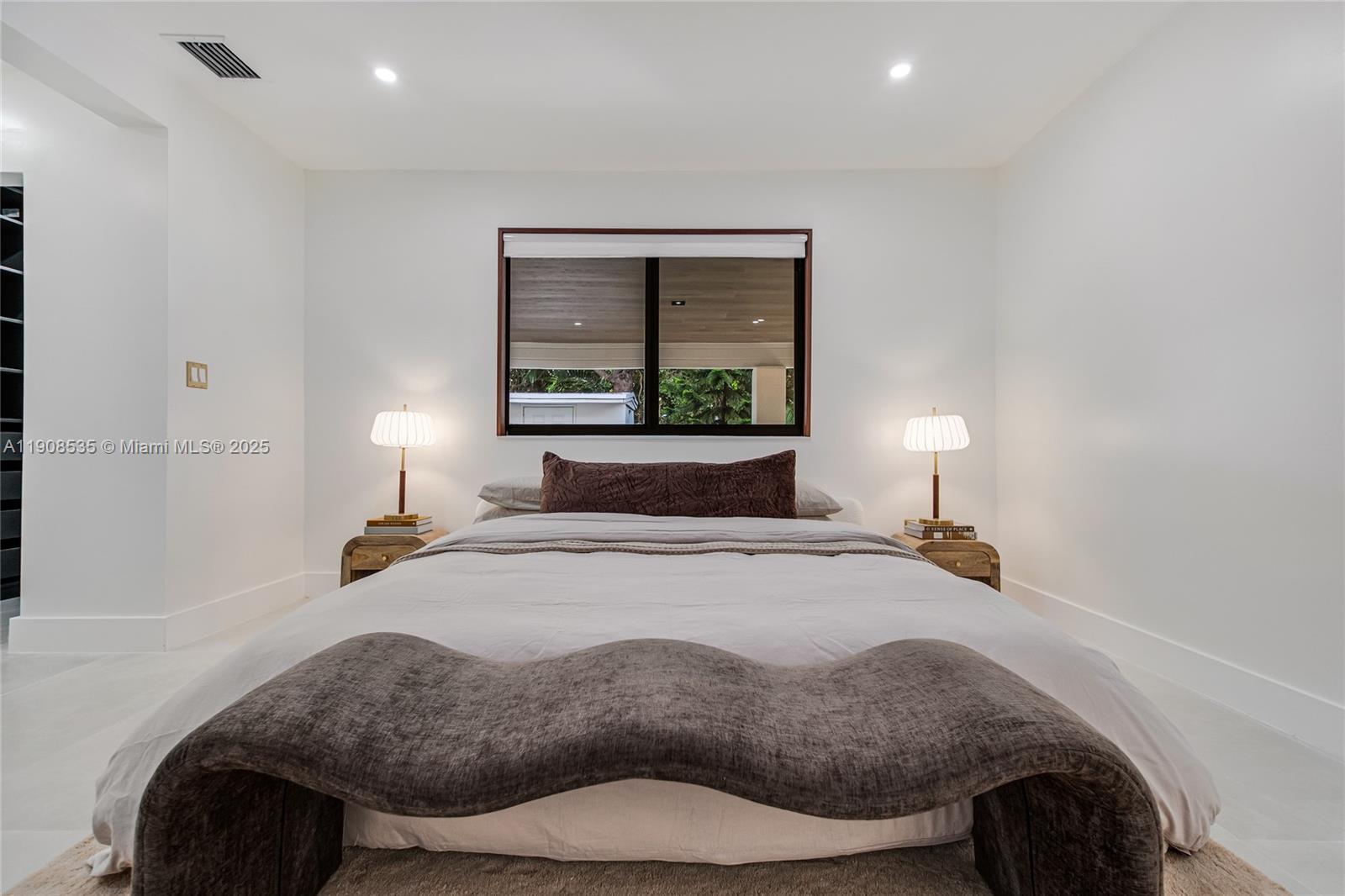 1244 Southwest 14th Street Miami, FL 33145 - Photo 33 of 63 a bedroom with a bed and a lamp
