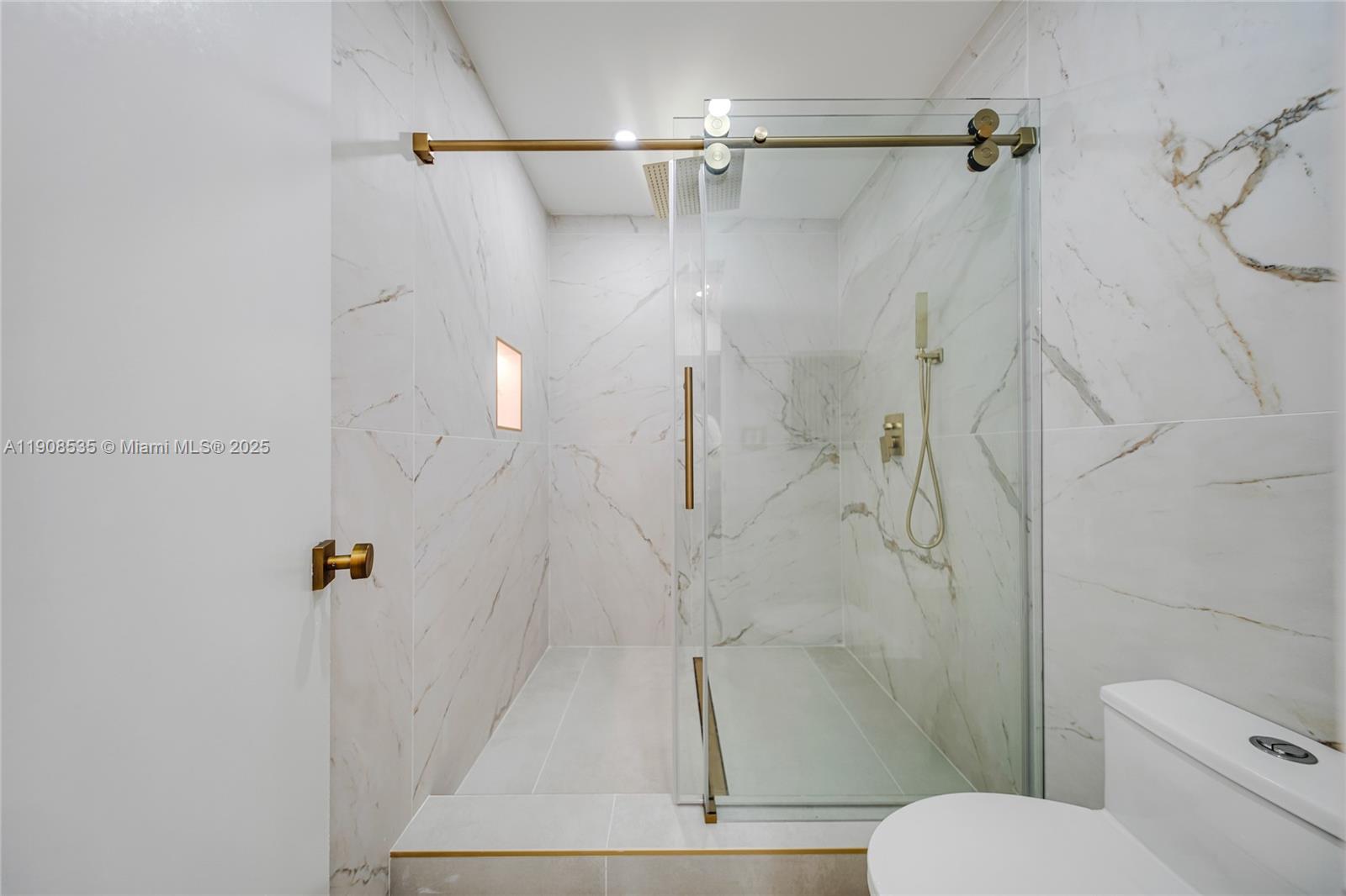1244 Southwest 14th Street Miami, FL 33145 - Photo 40 of 63 a bathroom with a shower and toilet