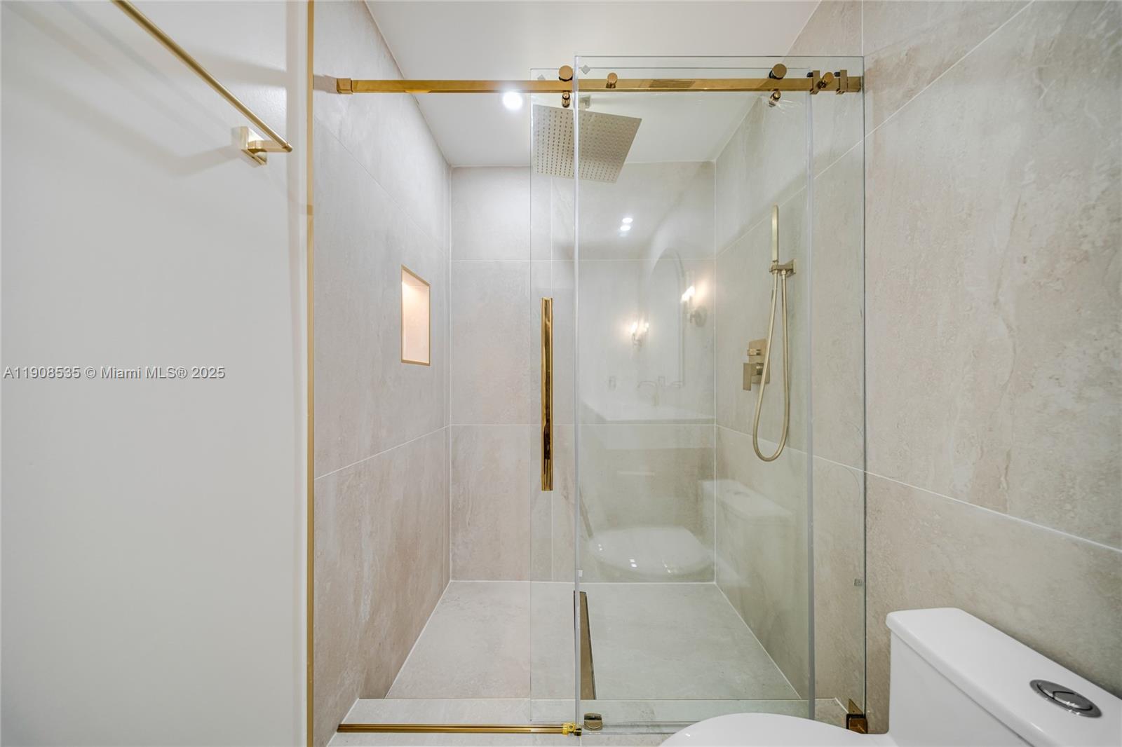 1244 Southwest 14th Street Miami, FL 33145 - Photo 45 of 63 a bathroom with a shower a toilet and sink