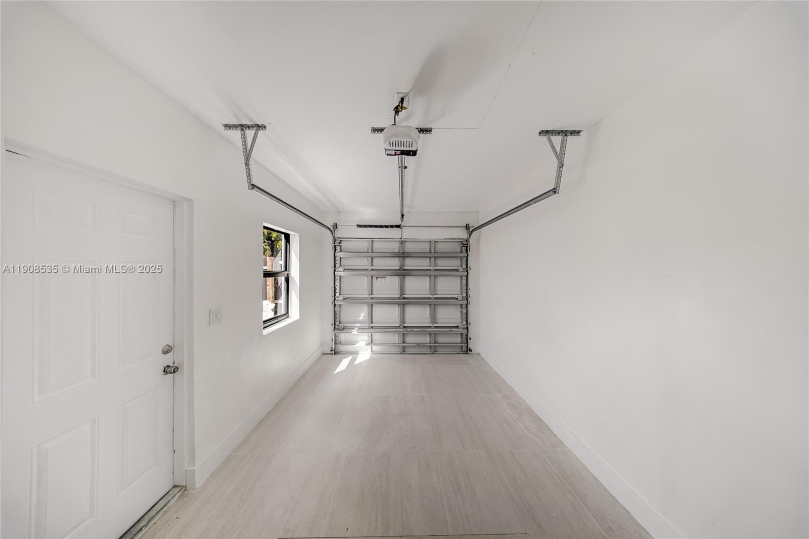 1244 Southwest 14th Street Miami, FL 33145 - Photo 55 of 63 a view of entryway and chandelier fan
