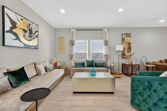 a living room with furniture and a couch