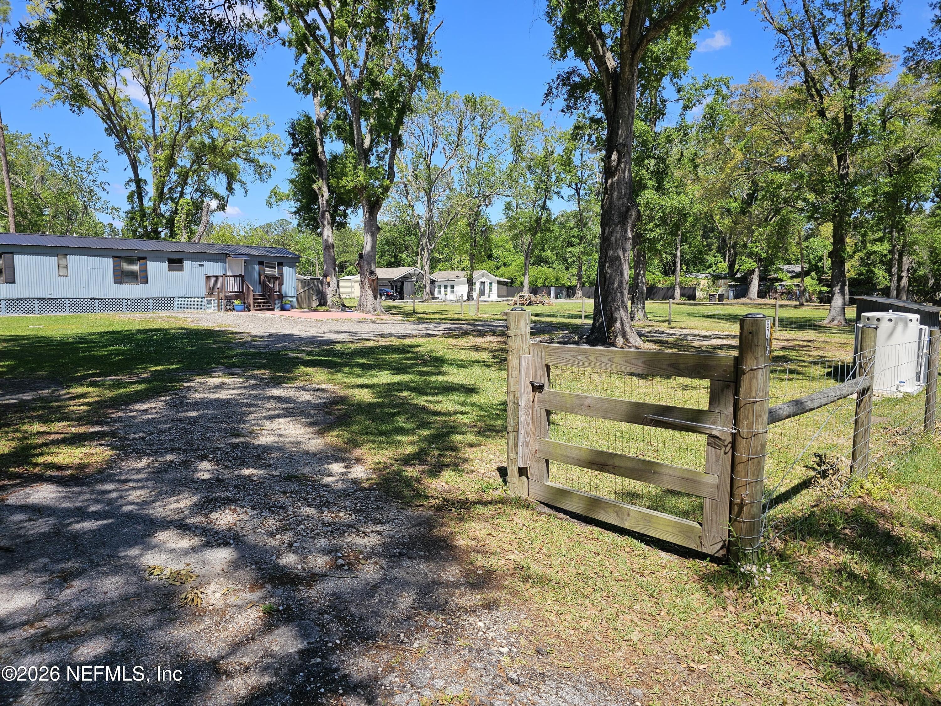 6715 Pickettville Road Jacksonville, FL 32254 - Photo 3 of 25 2a96e75a-4f2c-4236-915e-70afe5647dec