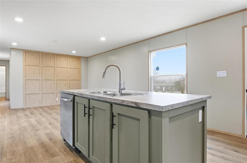 224 Derek Road Eddy, TX 76524 - Photo 7 of 24 a kitchen with a sink and cabinets