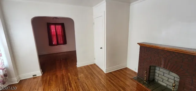 a view of front door with wooden floor