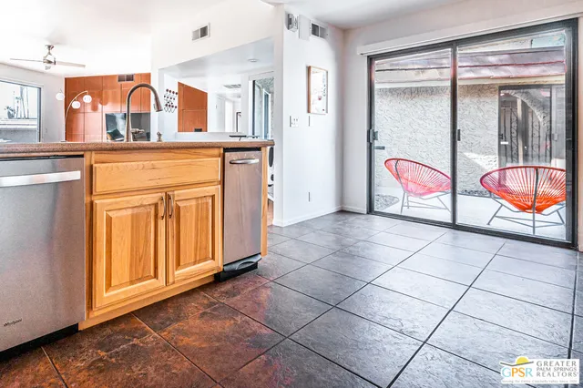 a view of a refrigerator in the kitchen
