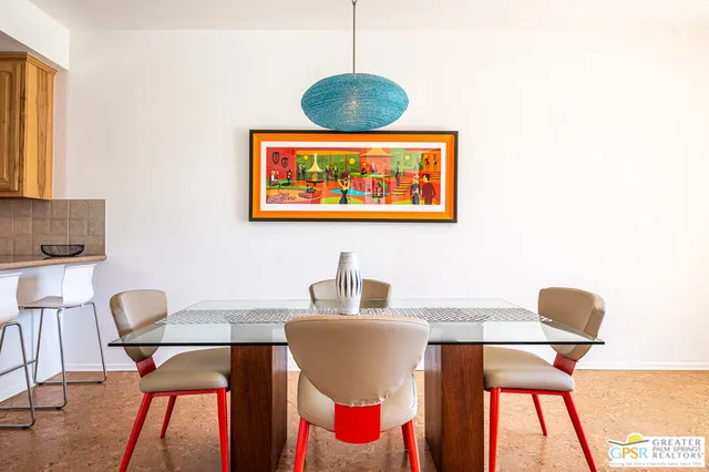 a workspace with furniture and window