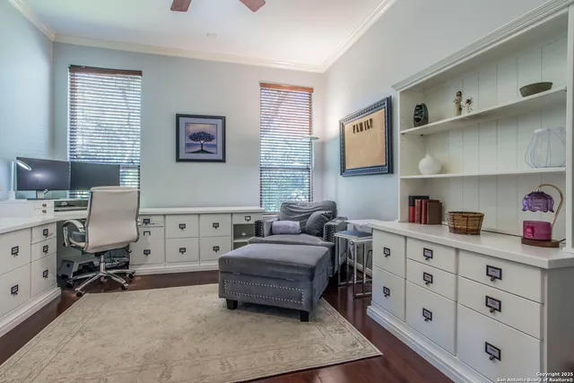 a bedroom with furniture and a window