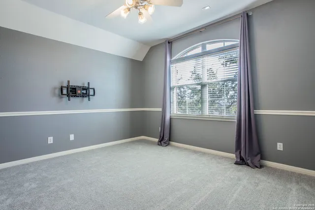 an empty room with a empty space and a window