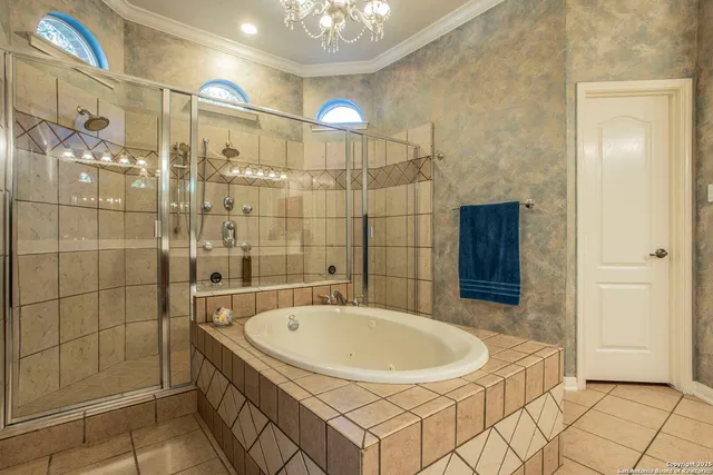 a bathroom with a sink and shower