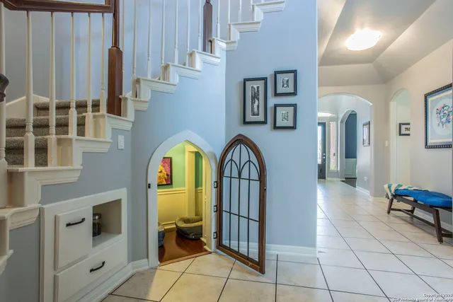 a view of living room with furniture and windows