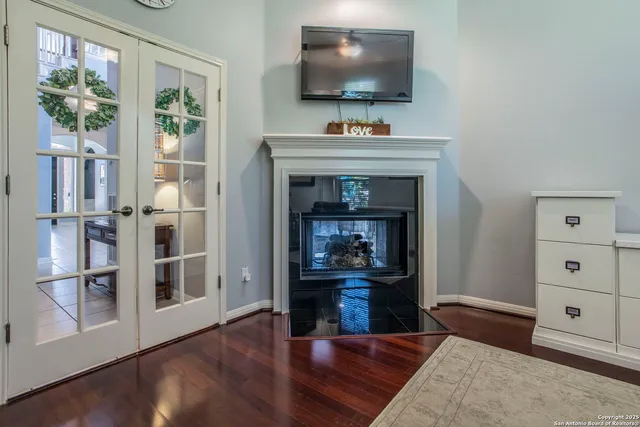 a view of living room with furniture and flat screen tv