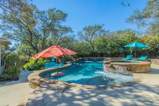 a view of a backyard with a tub