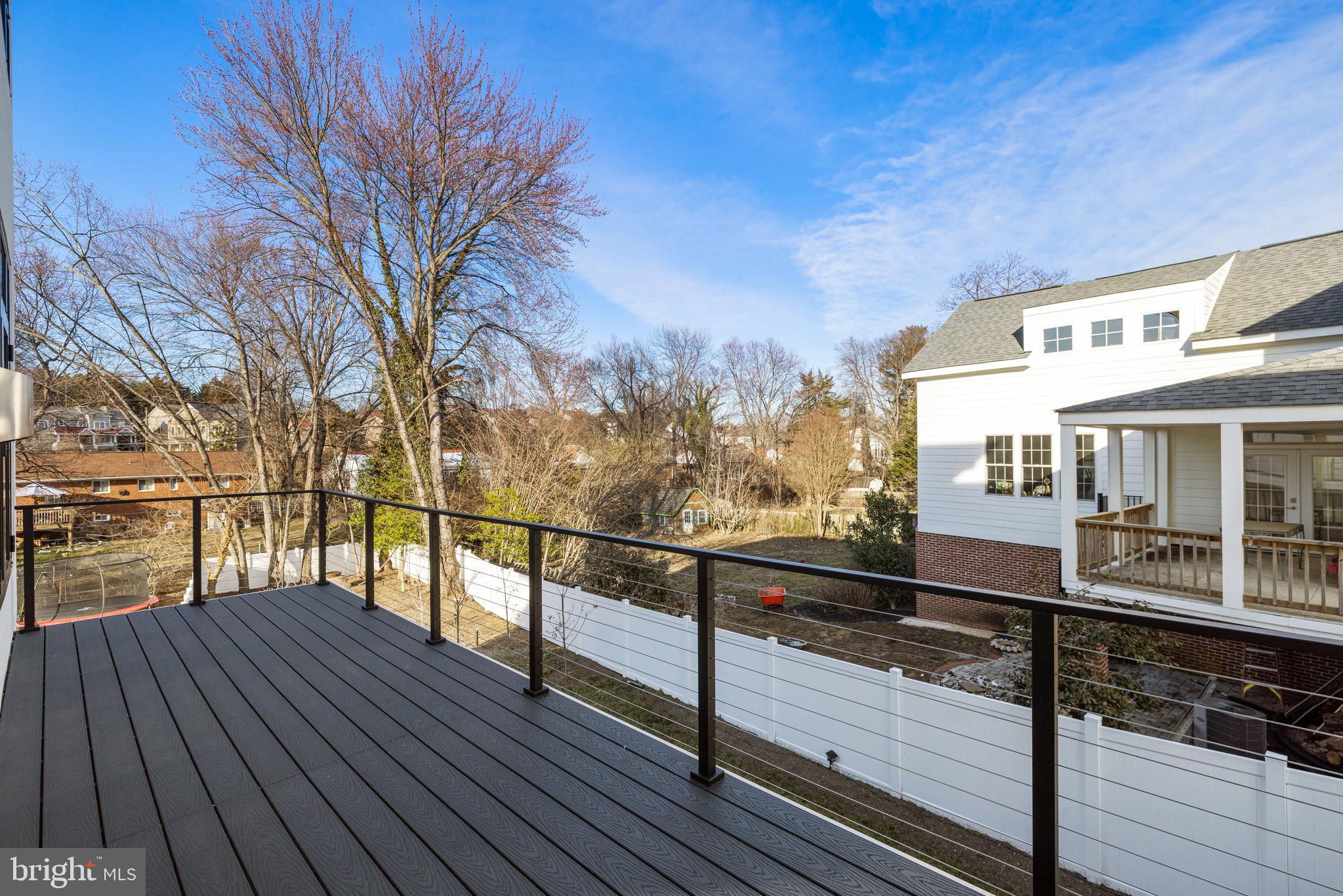 1573 Westmoreland Street McLean, VA 22101 - Photo 15 of 54 a view of a house with wooden deck