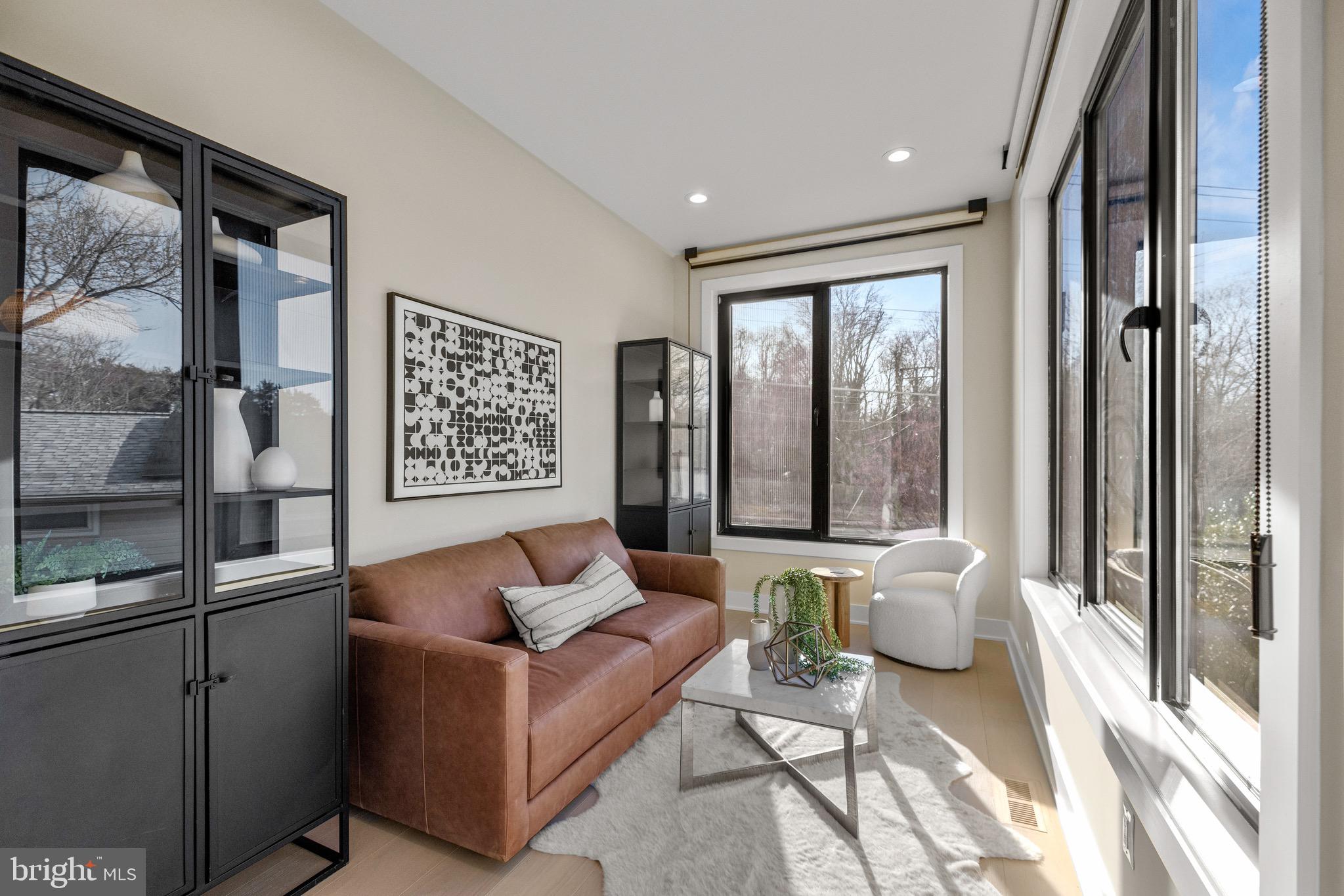 1573 Westmoreland Street McLean, VA 22101 - Photo 20 of 54 a living room with furniture and a large window