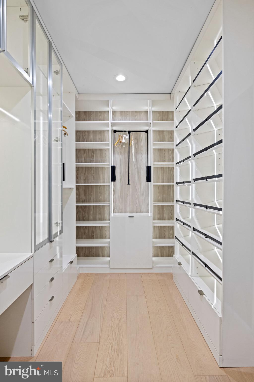 1573 Westmoreland Street McLean, VA 22101 - Photo 27 of 54 a view of walk in closet with empty racks