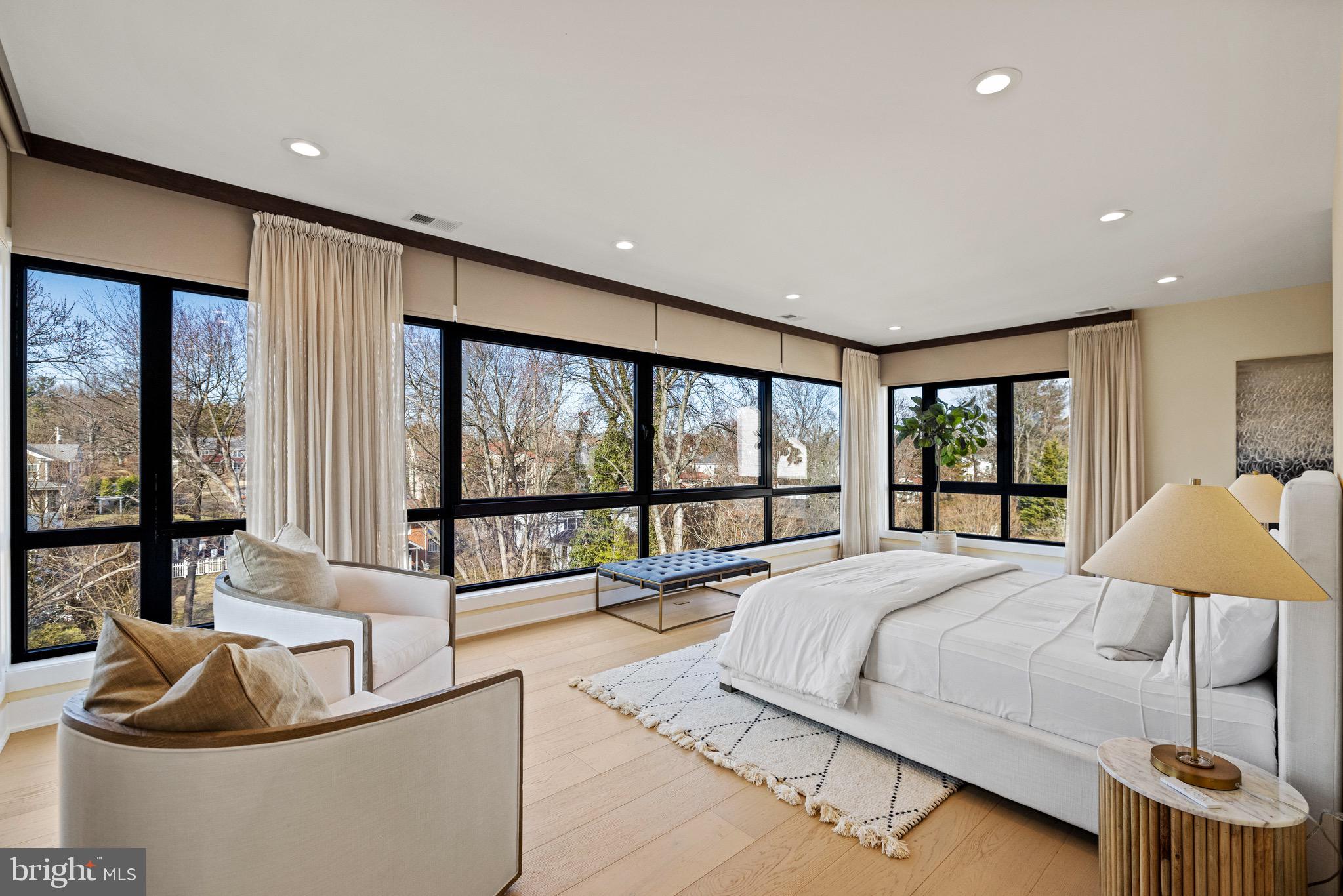 1573 Westmoreland Street McLean, VA 22101 - Photo 6 of 54 a spacious bedroom with a large bed and a large window