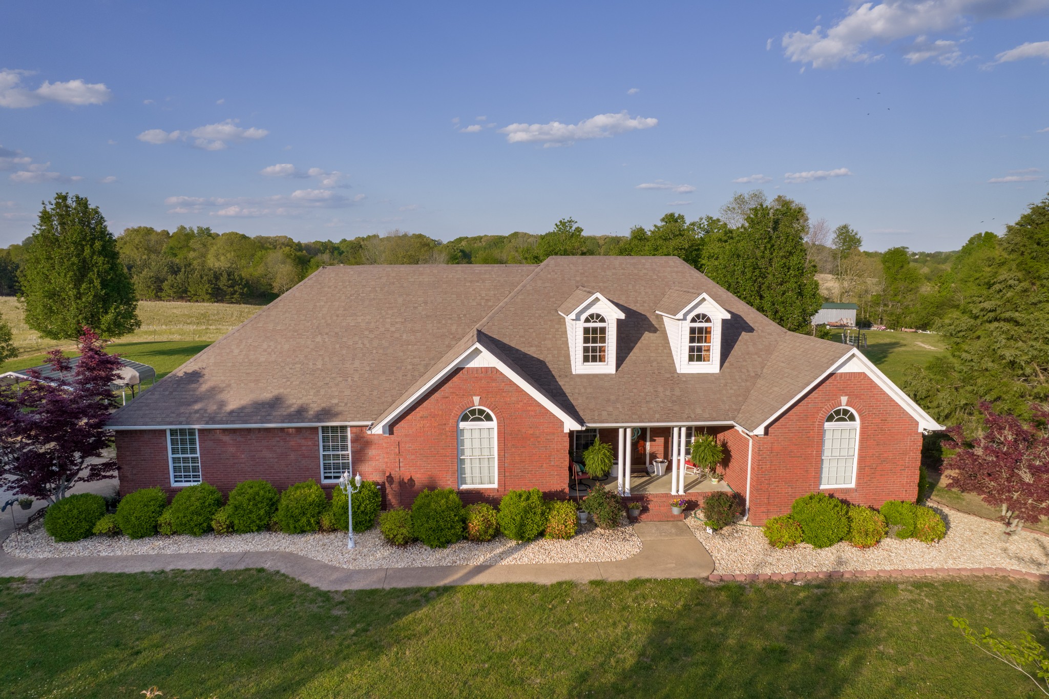 17 Marks Branch Road Leoma, TN 38468 - Photo 3 of 50 a front view of a house with garden