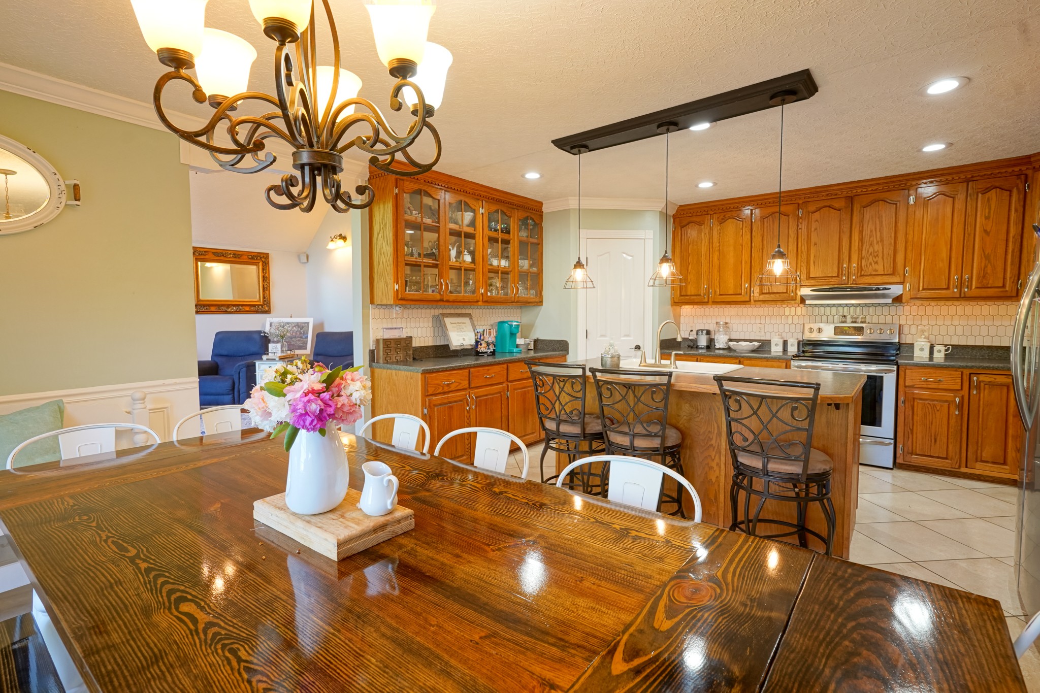 17 Marks Branch Road Leoma, TN 38468 - Photo 22 of 50 a kitchen with stainless steel appliances kitchen island granite countertop a table and chairs in it
