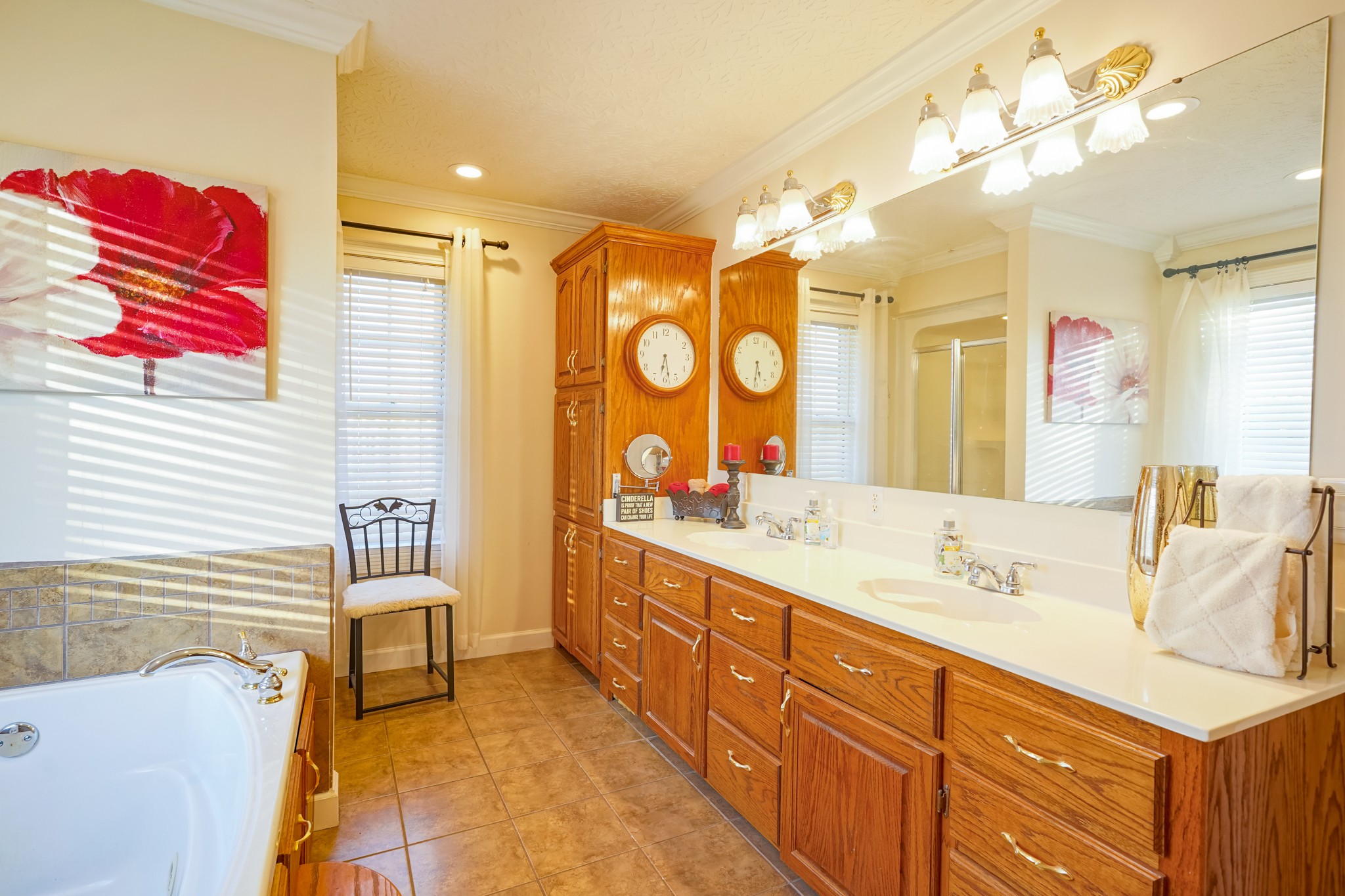 17 Marks Branch Road Leoma, TN 38468 - Photo 29 of 50 a spacious bathroom with a double vanity sink mirror and a bathtub