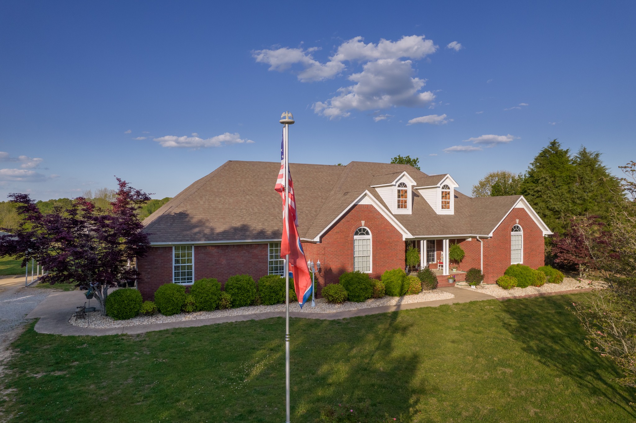 17 Marks Branch Road Leoma, TN 38468 - Photo 4 of 50 a front view of a house with garden