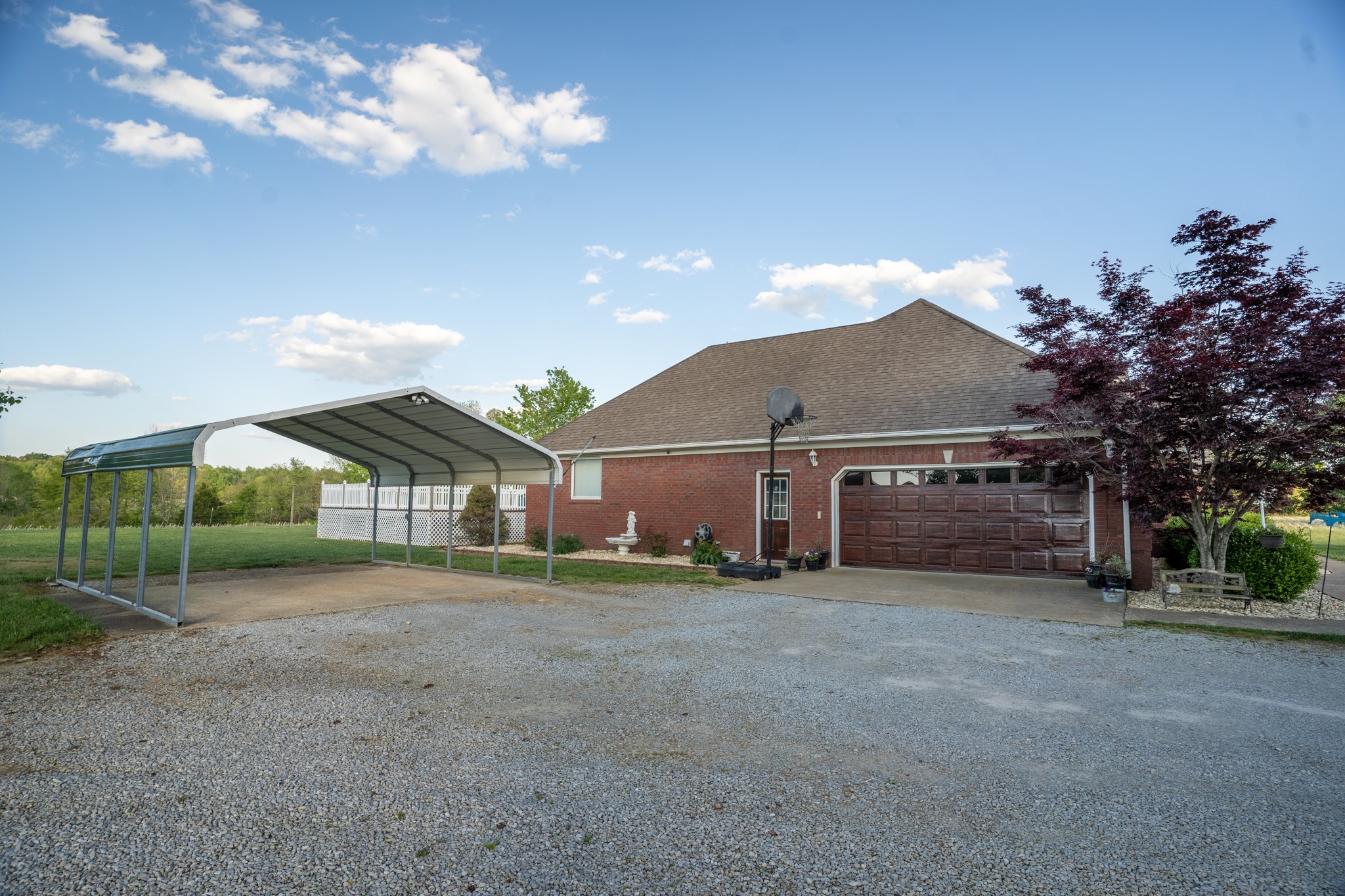 17 Marks Branch Road Leoma, TN 38468 - Photo 10 of 50 a view of a house with a yard and garage