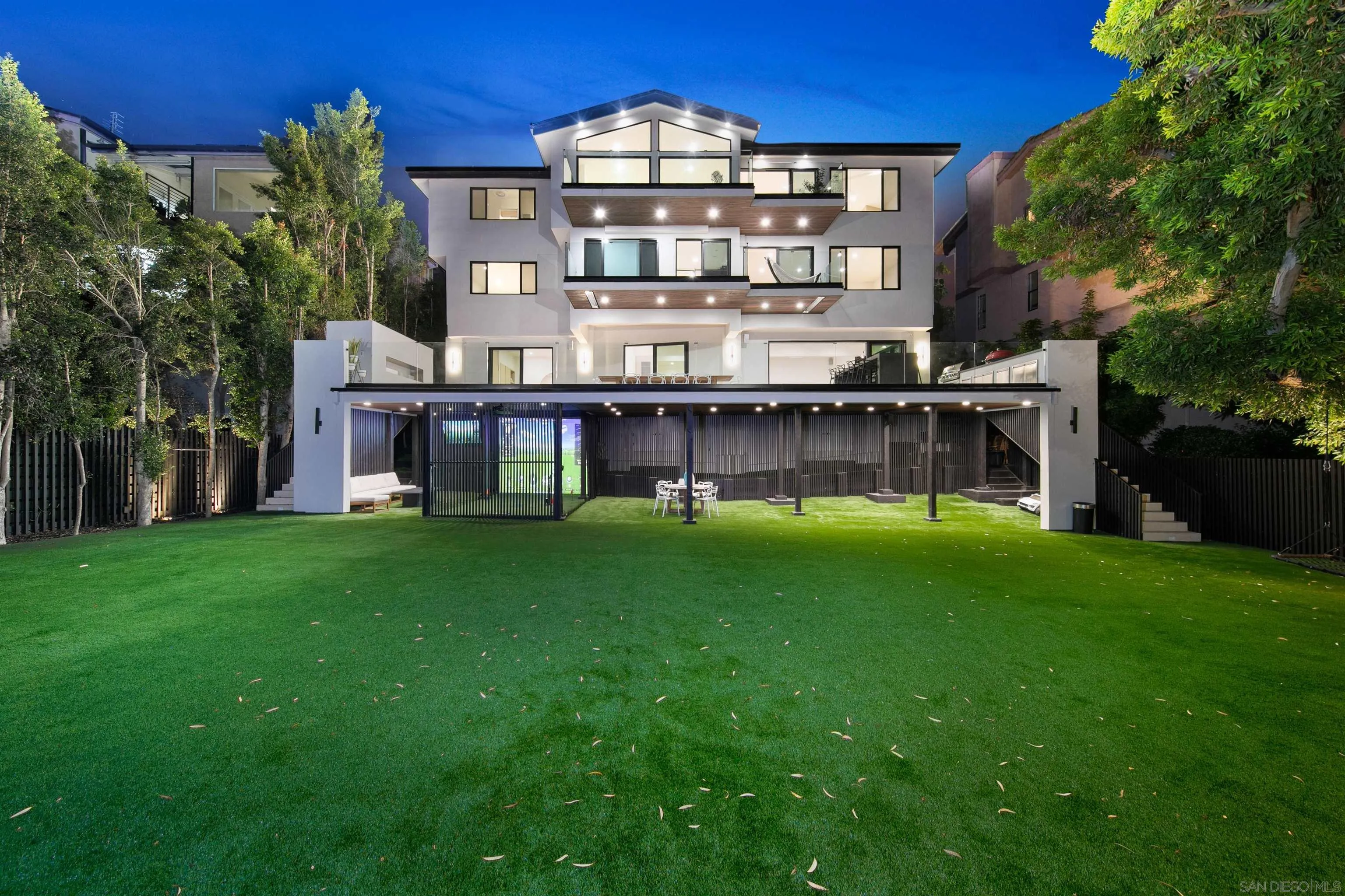 5675 Soledad Mountain Road La Jolla, CA 92037 - Photo 1 of 74 a view of a brick building next to a big yard