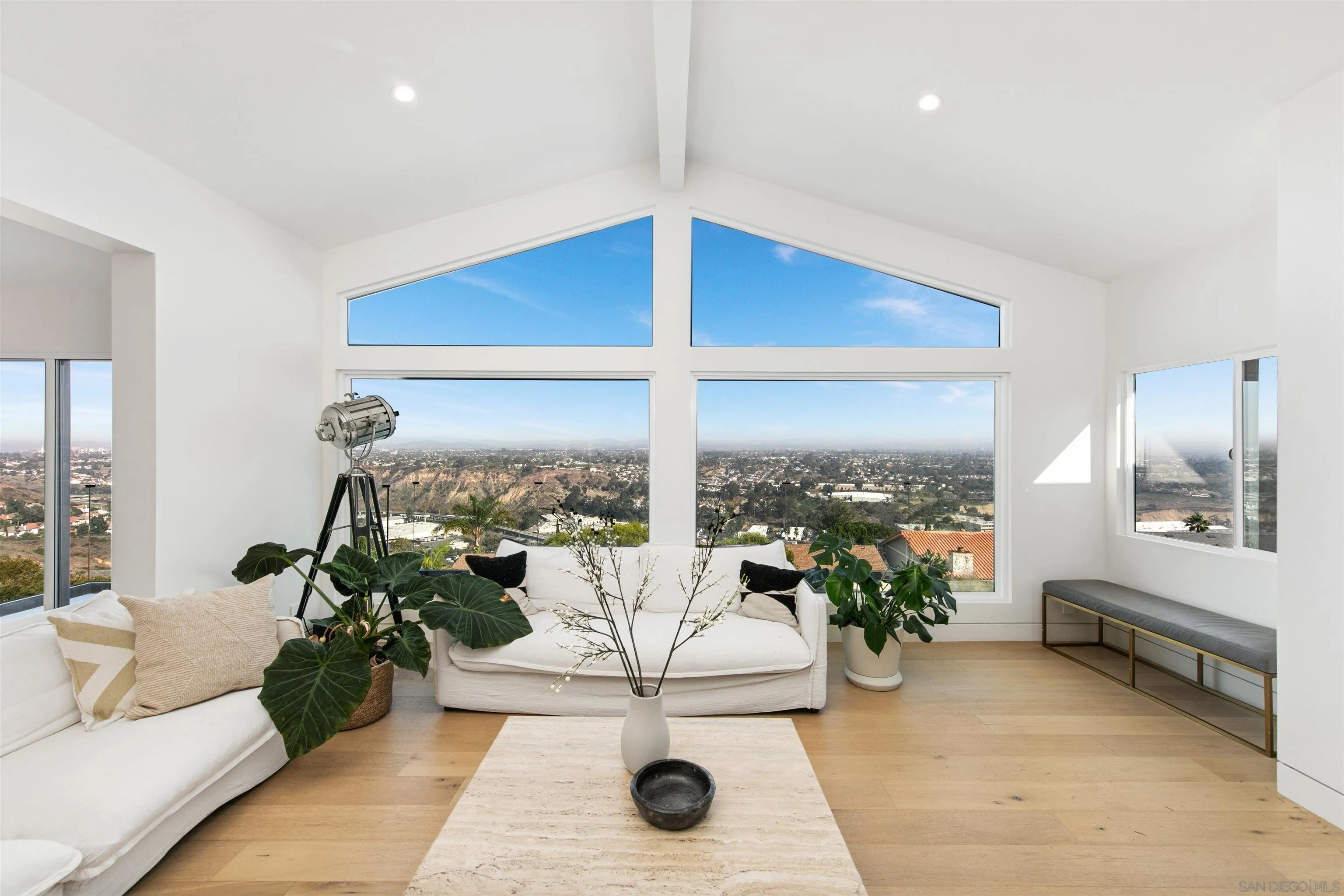 5675 Soledad Mountain Road La Jolla, CA 92037 - Photo 19 of 74 a living room with furniture and a large window