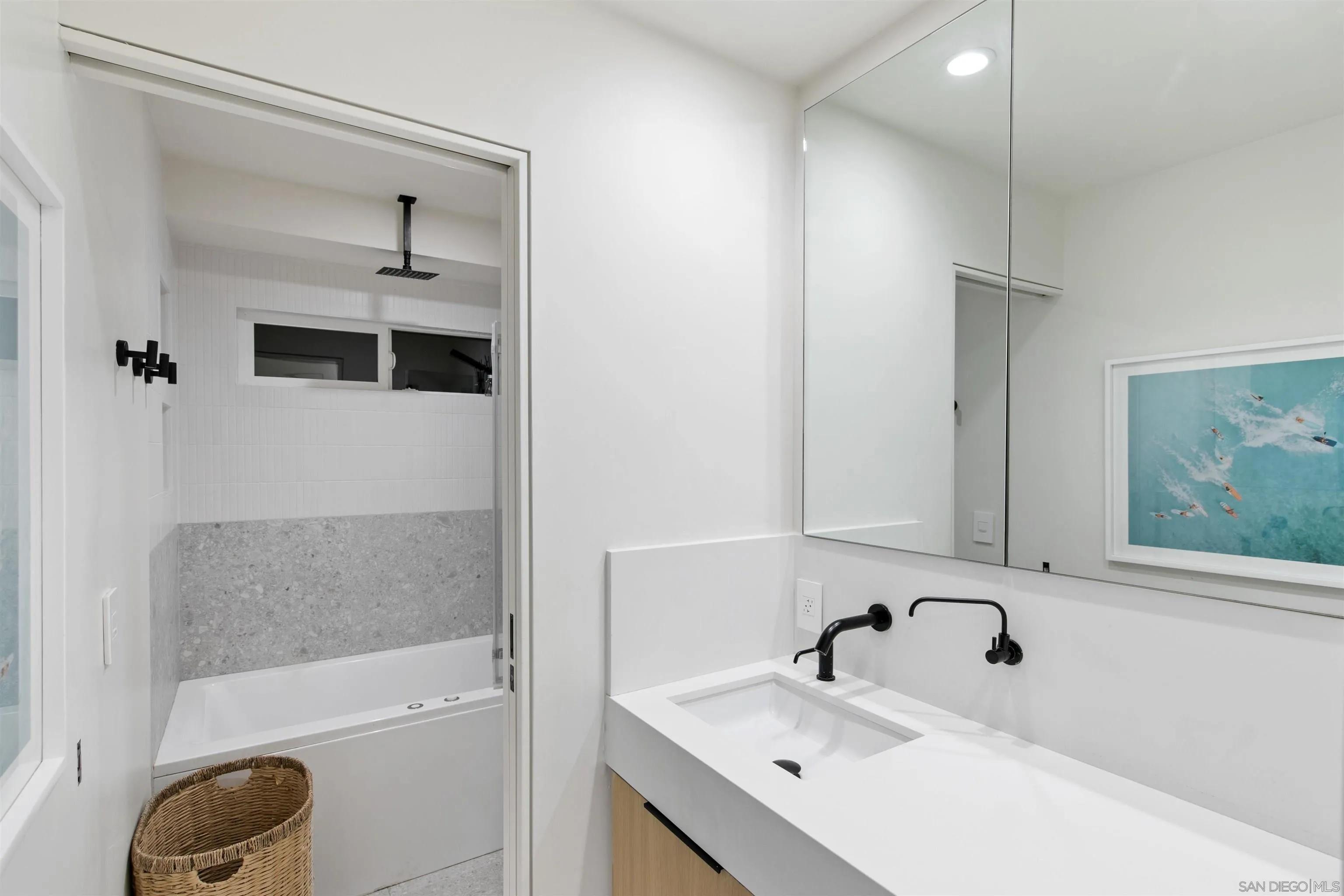 5675 Soledad Mountain Road La Jolla, CA 92037 - Photo 31 of 74 a bathroom with a sink and a bathtub