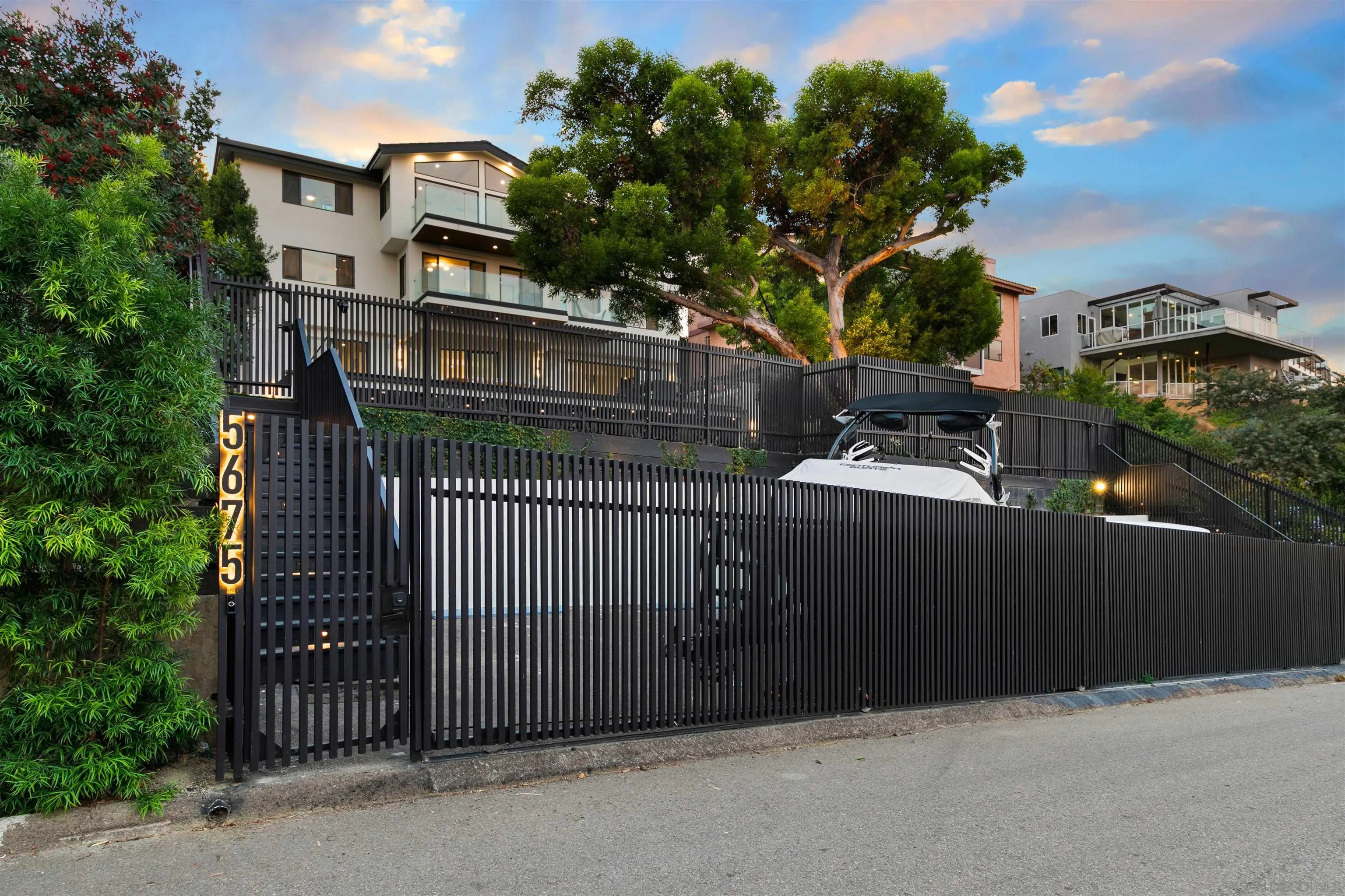 5675 Soledad Mountain Road La Jolla, CA 92037 - Photo 4 of 74 a backyard of a house with lots of green space