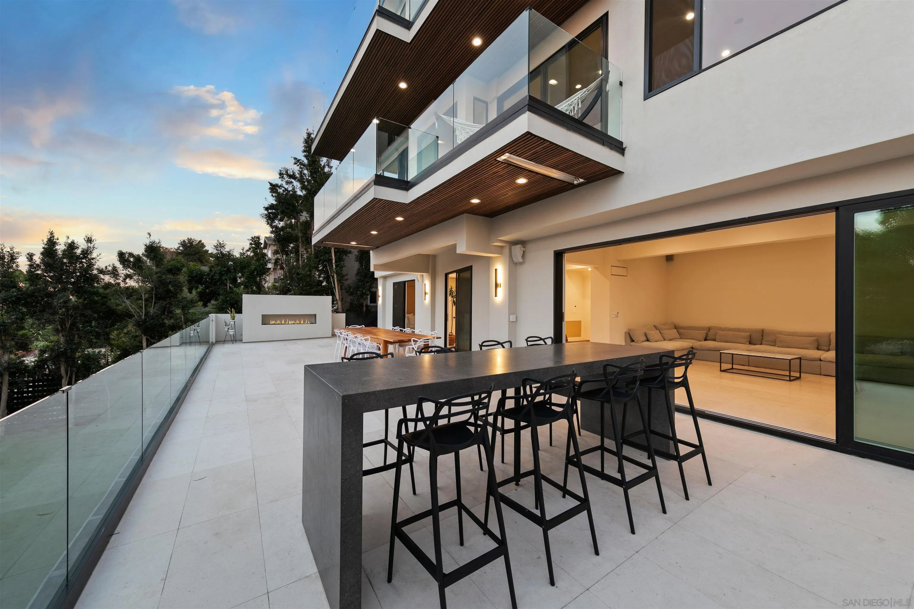 5675 Soledad Mountain Road La Jolla, CA 92037 - Photo 41 of 74 a view of a patio with a table and chairs