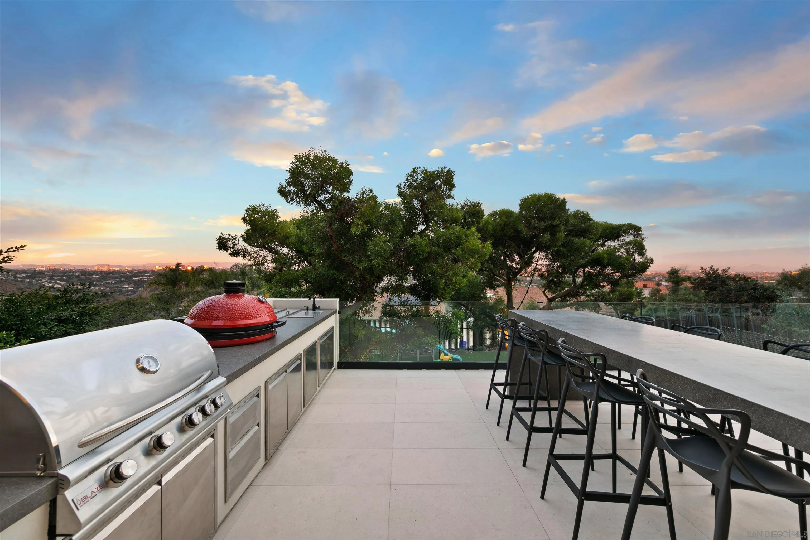 5675 Soledad Mountain Road La Jolla, CA 92037 - Photo 42 of 74 a view of a chairs and table on the terrace