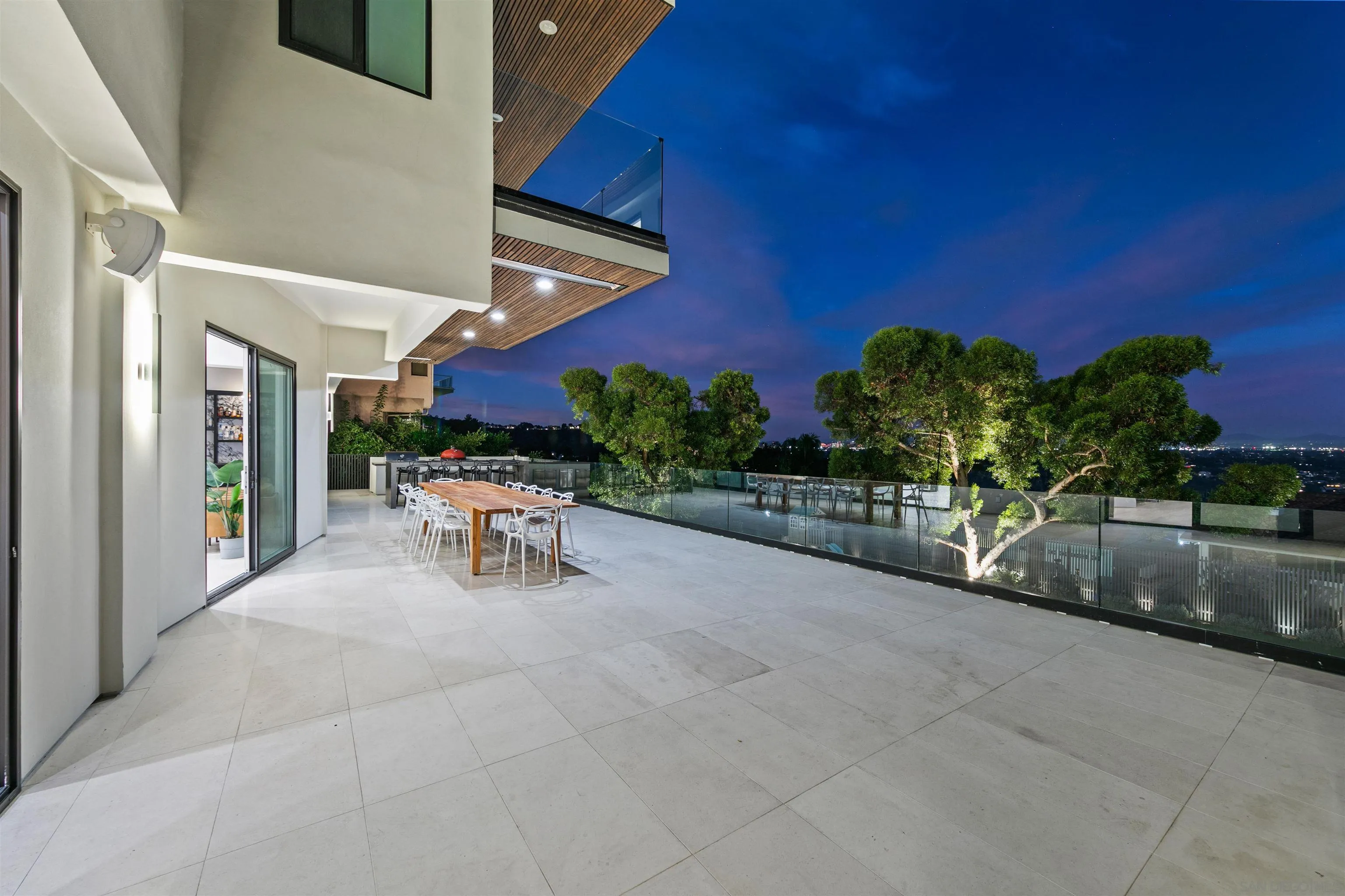 5675 Soledad Mountain Road La Jolla, CA 92037 - Photo 53 of 74 a building outdoor space with patio furniture and potted plants