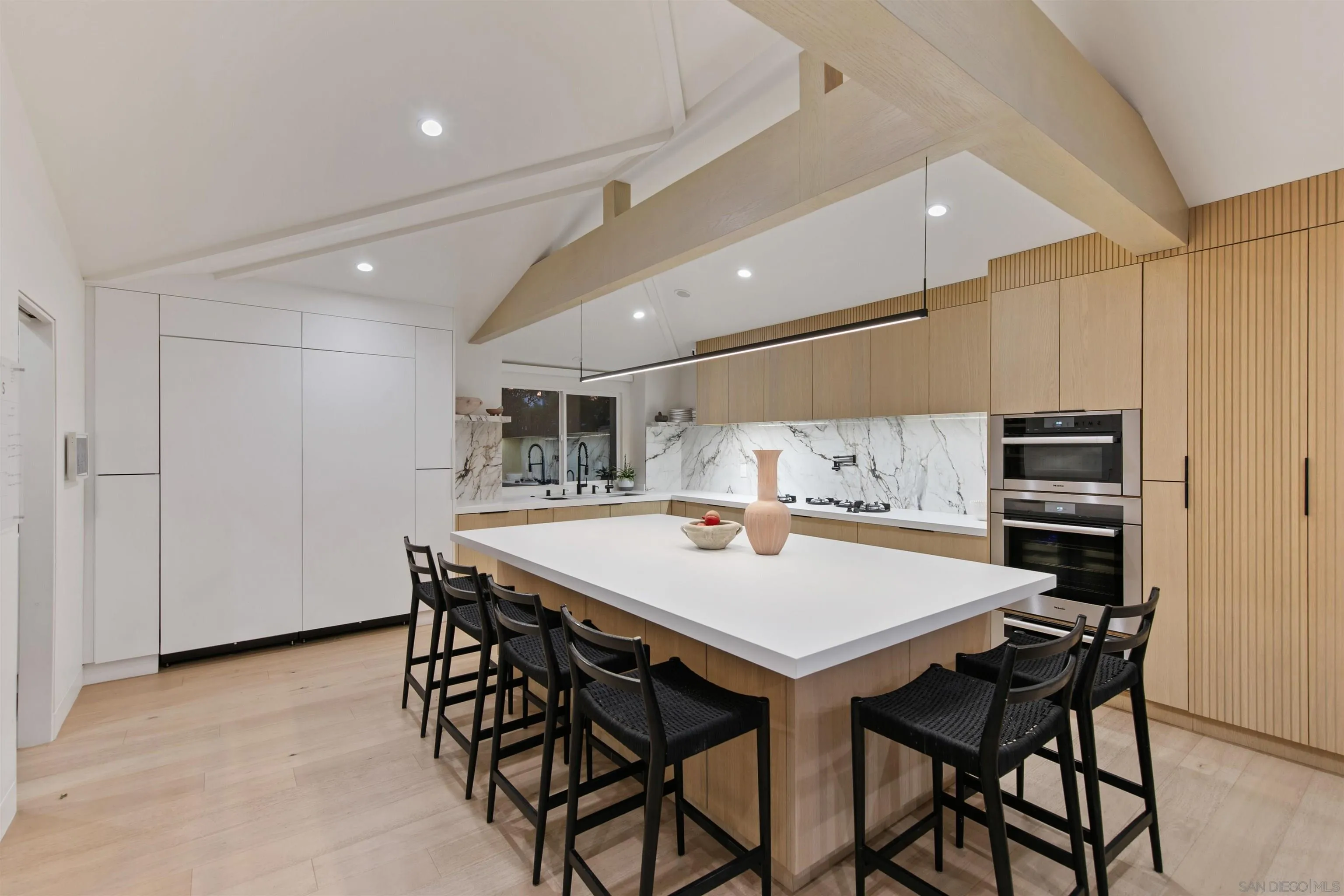 5675 Soledad Mountain Road La Jolla, CA 92037 - Photo 8 of 74 a view of a dining room with furniture