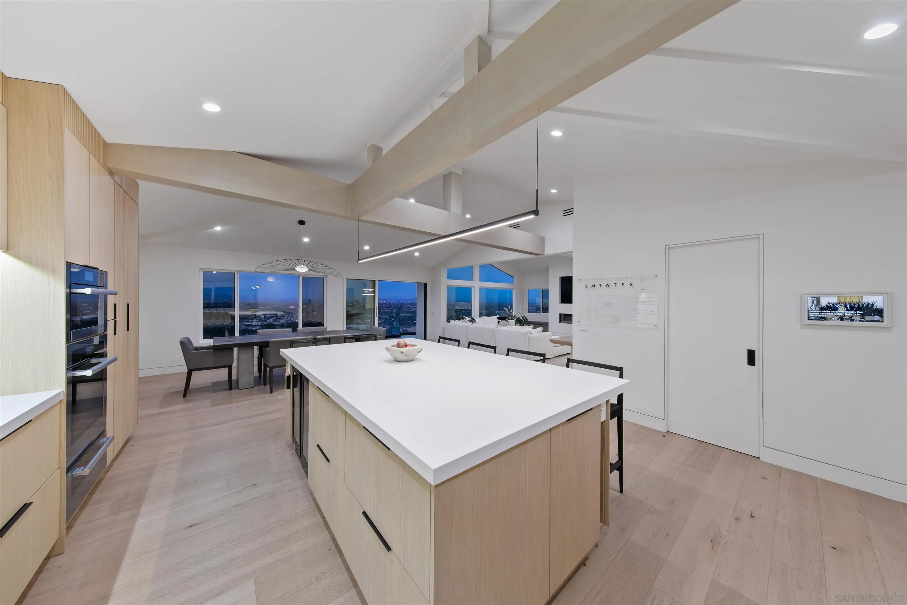5675 Soledad Mountain Road La Jolla, CA 92037 - Photo 10 of 74 a large kitchen with a large counter top appliances and cabinets