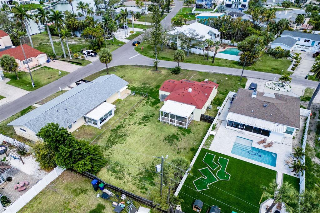 15822 Redington Drive Redington Beach, FL 33708 - Photo 7 of 11 an aerial view of a house with a garden