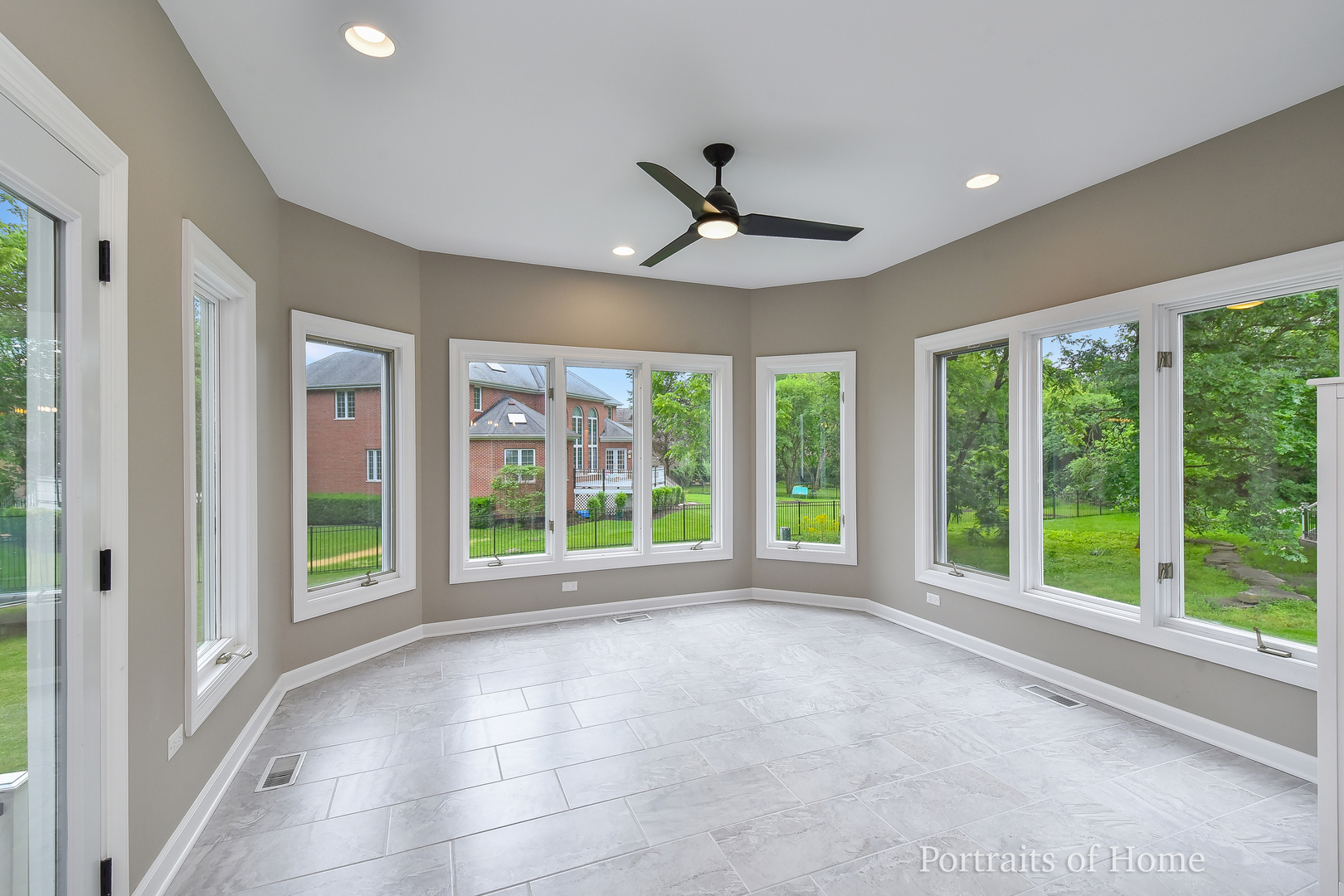 3721 Red Oak Lane Lisle, IL 60532 - Photo 12 of 35 a view of an empty room with wooden floor and a window