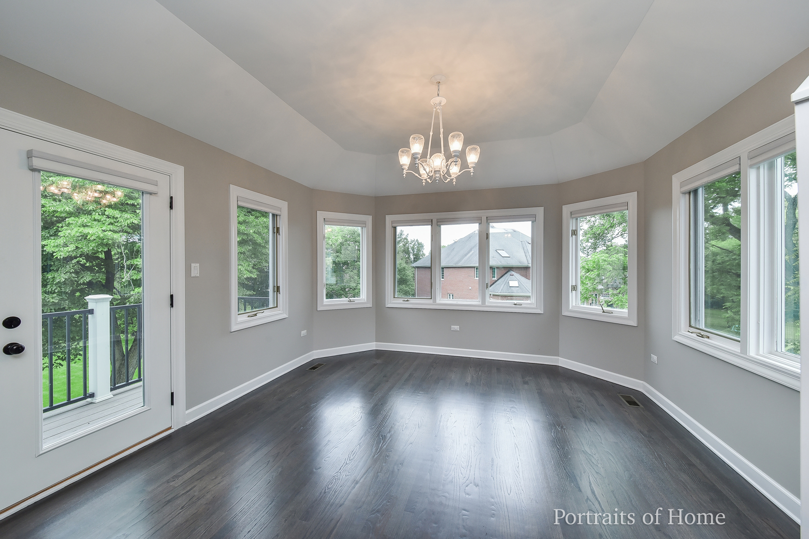 3721 Red Oak Lane Lisle, IL 60532 - Photo 18 of 35 a view of empty room with wooden floor and fan