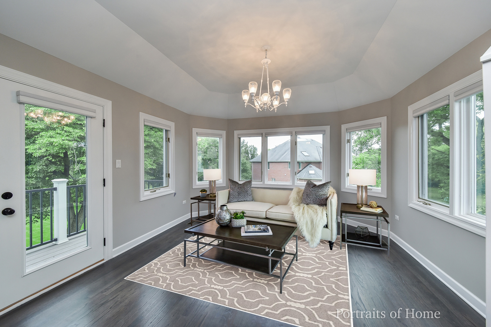 3721 Red Oak Lane Lisle, IL 60532 - Photo 19 of 35 a living room with furniture and a chandelier