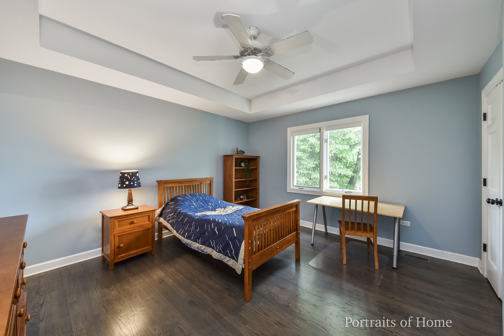 3721 Red Oak Lane Lisle, IL 60532 - Photo 21 of 35 a living room with a bed furniture and a window