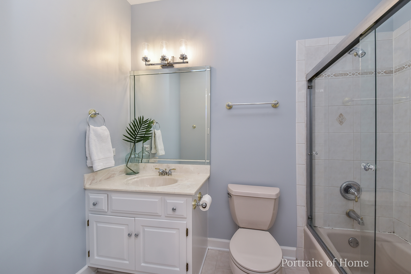 3721 Red Oak Lane Lisle, IL 60532 - Photo 25 of 35 a bathroom with a toilet sink and shower